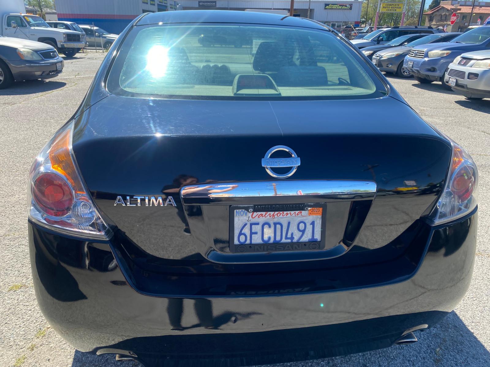 2009 Nissan Altima 2.5 (1N4AL21E79C) with an 2.5L L4 DOHC 16V engine, 6-Speed Manual Overdrive transmission, located at 44356 Date Ave., Lancaster, CA, 93534, (661) 945-6555, 34.688919, -118.139374 - Photo #1